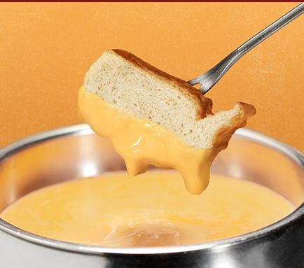 Melt Oodles Of Cheese On National Cheese Fondue Day!